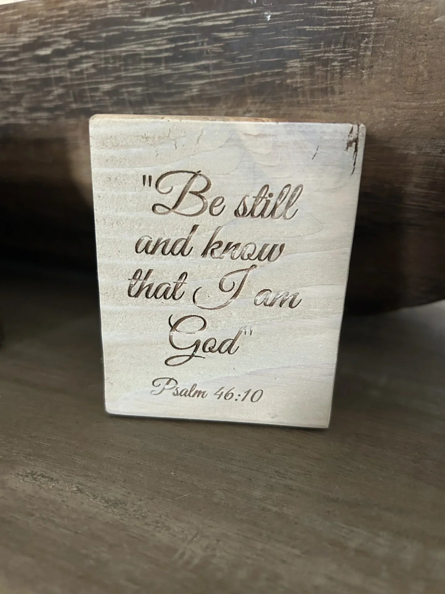 Engraved wood scripture block with Psalm 46:10 by Port Royal Woodworks on rustic table