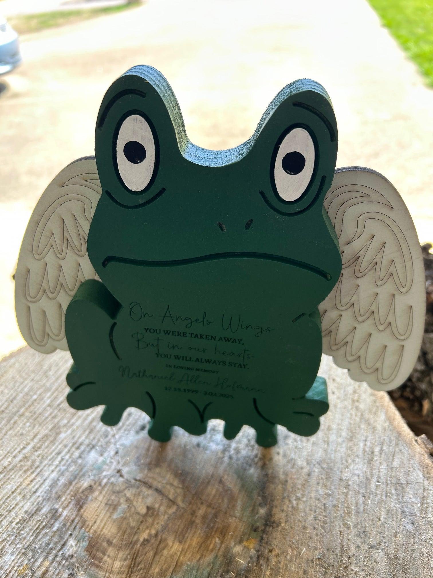 Handmade wood-carved green frog figurine with white angel wings
