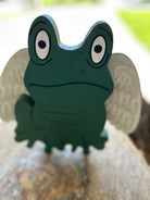 Handmade wood-carved green frog figurine with white angel wings