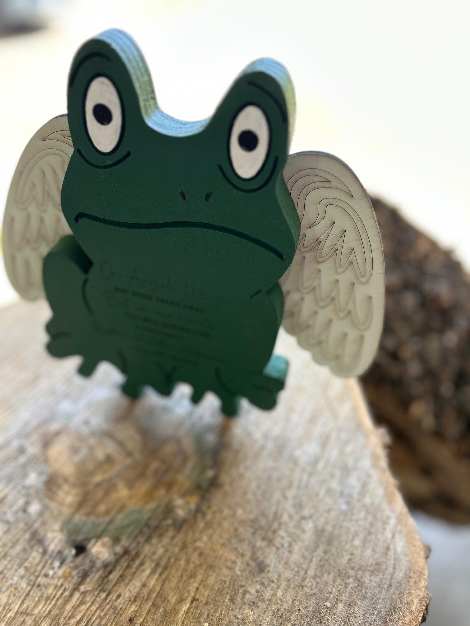 Handmade wood-carved green frog figurine with white angel wings
