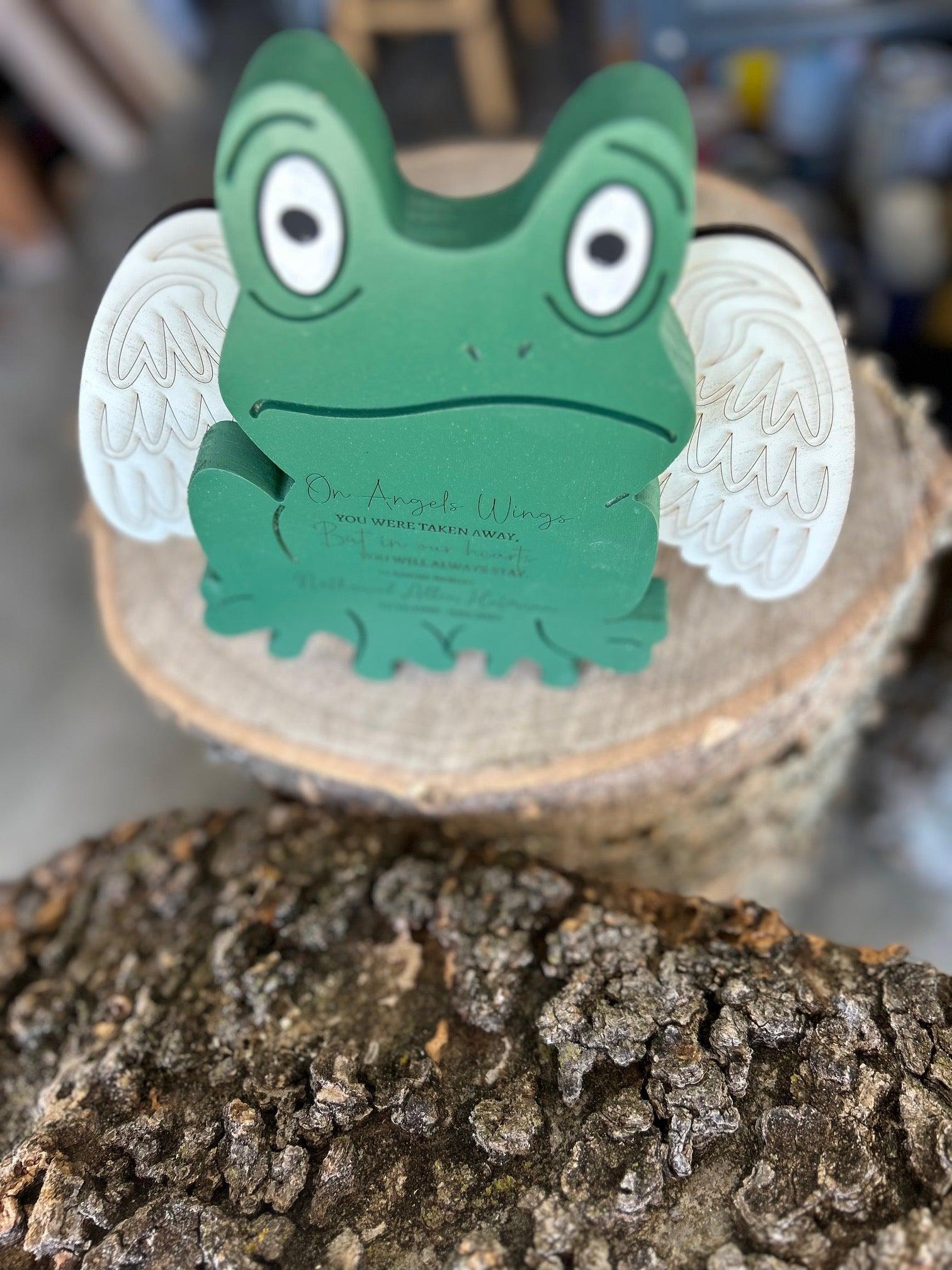 Handmade wood-carved green frog figurine with white angel wings