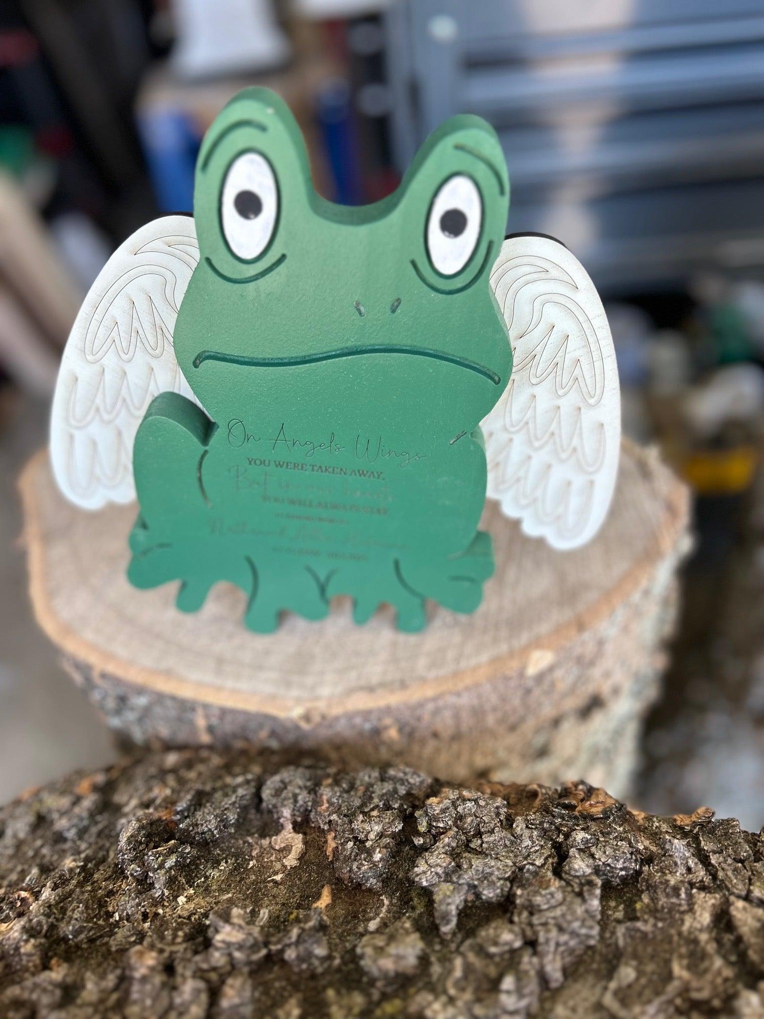 Handmade wood-carved green frog figurine with white angel wings