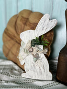 Handmade, hand-painted white crackle-style decorative bunny with white ribbon, ideal for home decor, Easter, or Spring settings.