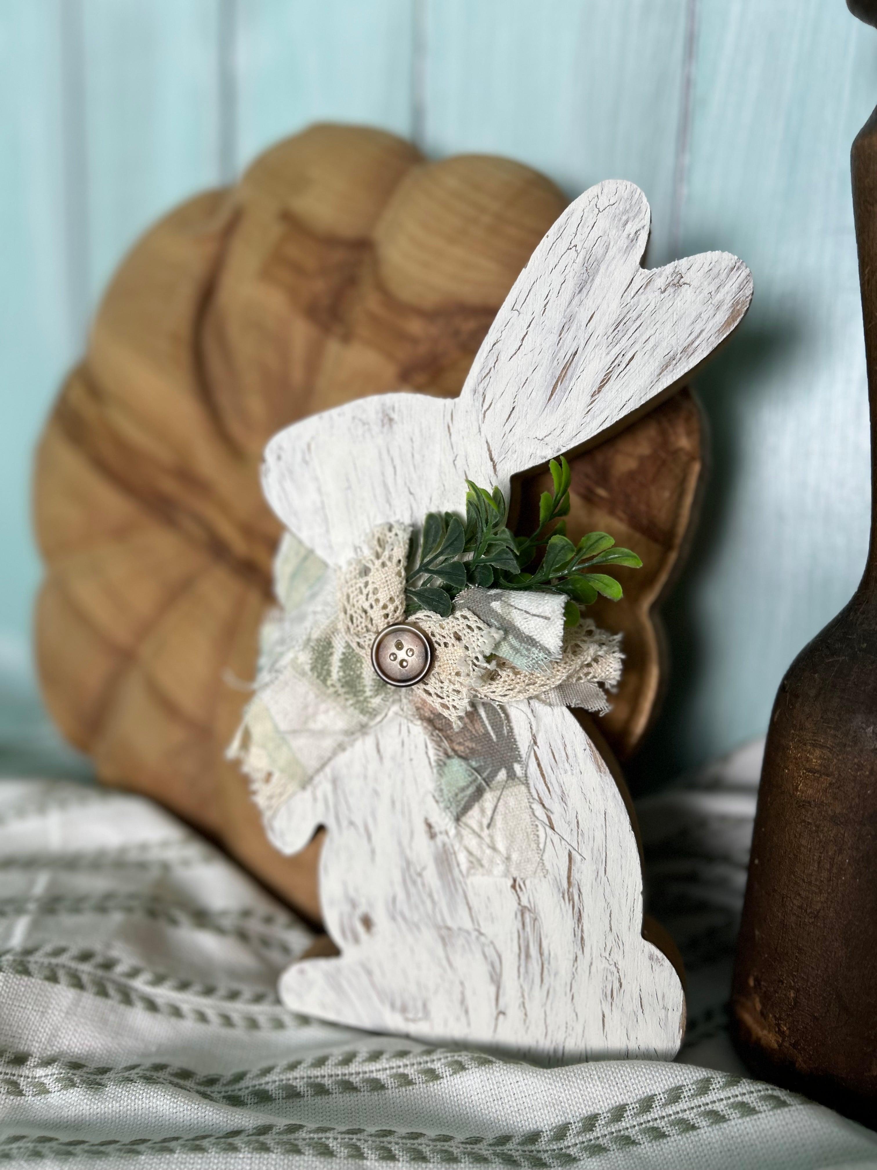 Handmade, hand-painted white crackle-style decorative bunny with white ribbon, ideal for home decor, Easter, or Spring settings.