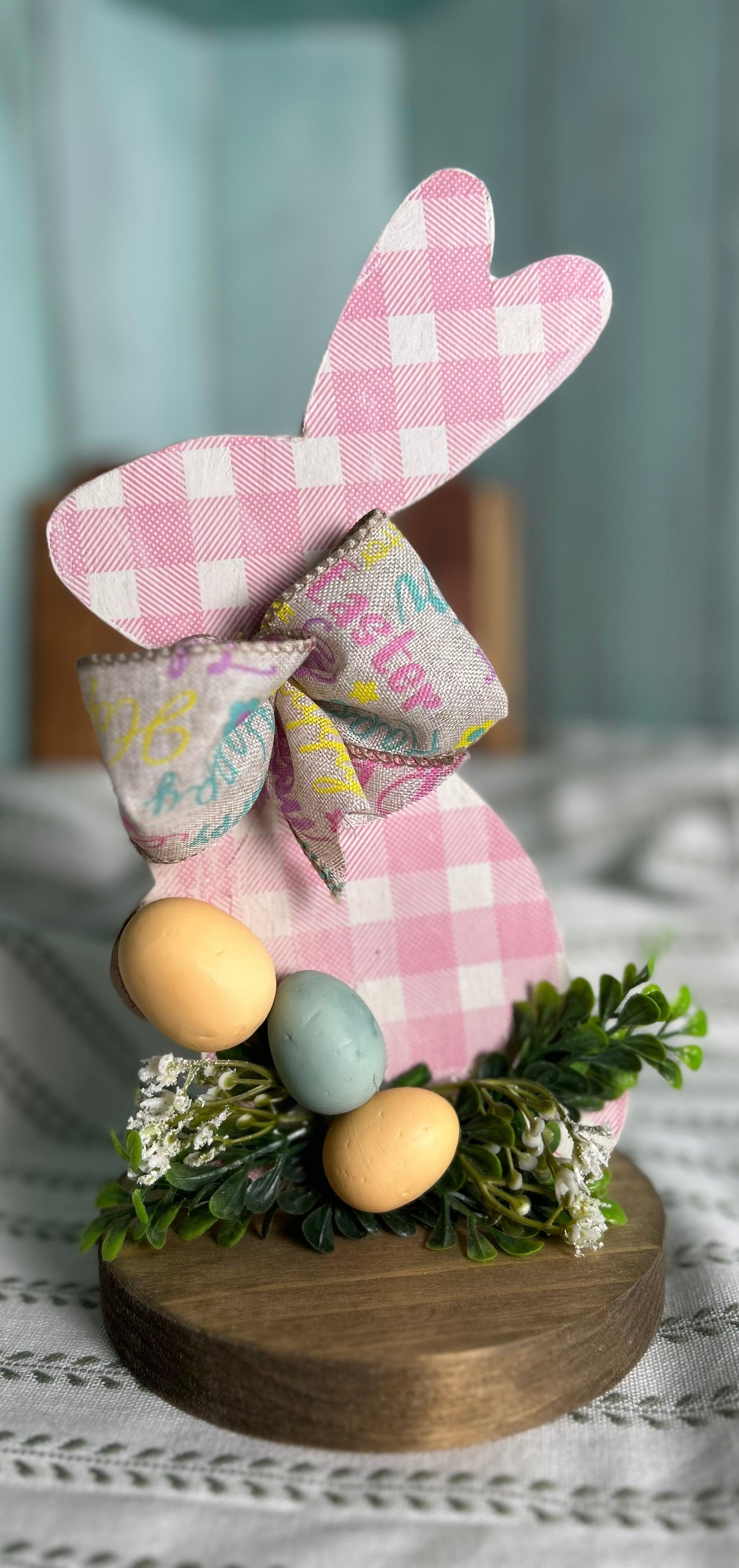 Handcrafted Pink Easter Bunny with Eggs and Ribbon on Pedestal
