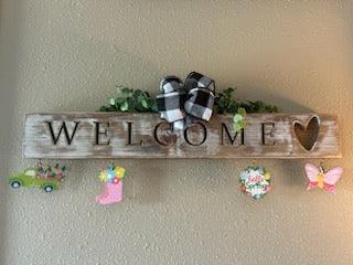 Handcrafted whitewashed pine carved welcome sign with all-seasons ornaments