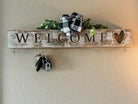 Handcrafted whitewashed pine carved welcome sign with all-seasons ornaments